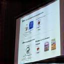 Screen showing a webinar presentation, symbolizing online learning and community events.