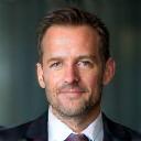 Professional headshot of John M., E-commerce Business Owner.